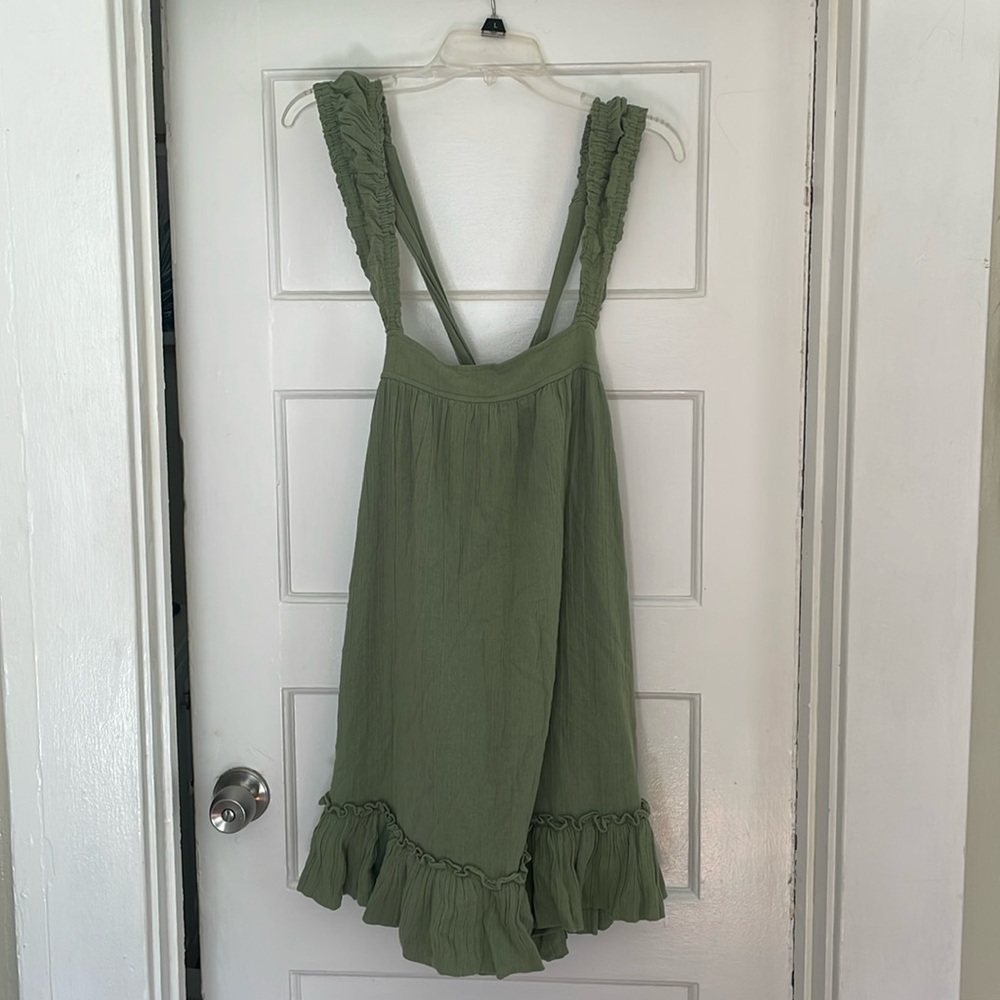 Free People green size medium mini dress with tags still on. Never before worn!